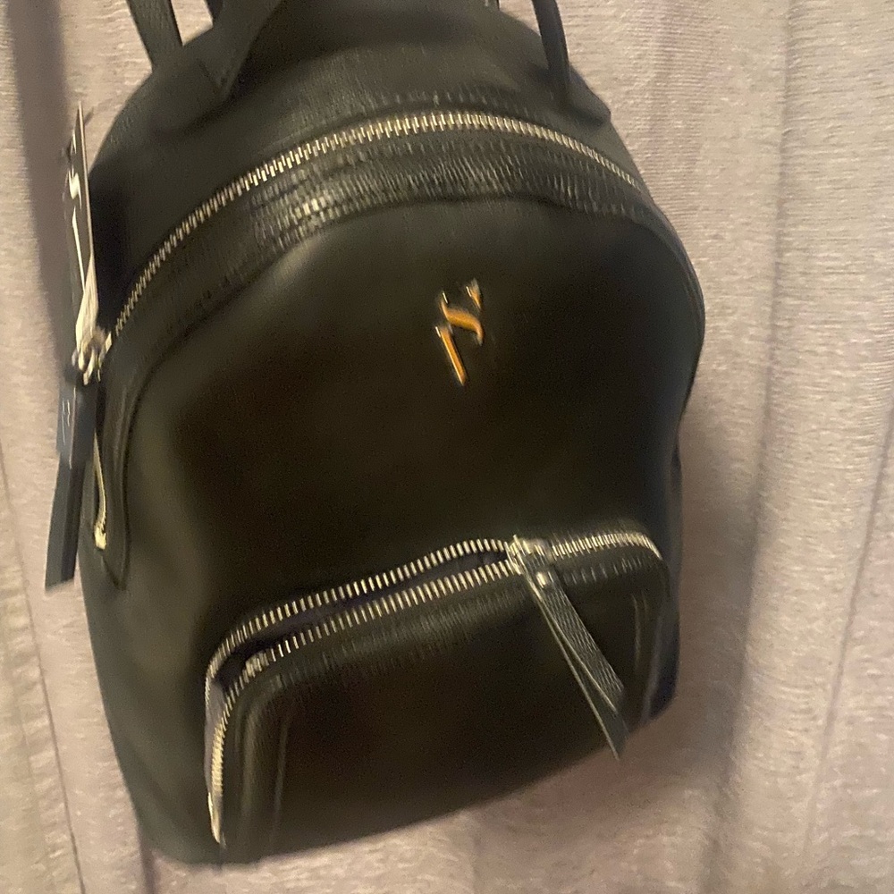 Purse/backpack style. Vera Wang.